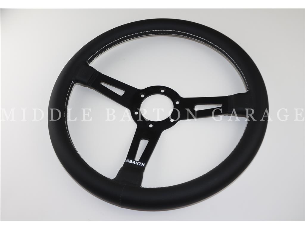 Fiat 500 Giannini original leather steering wheel with hub (black spokes).