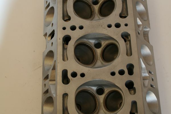 TWIN CAMCYLINDER HEAD COMPLETE WITH V/ SEATS AND GUIDES. EXCELLENT USED CONDITION