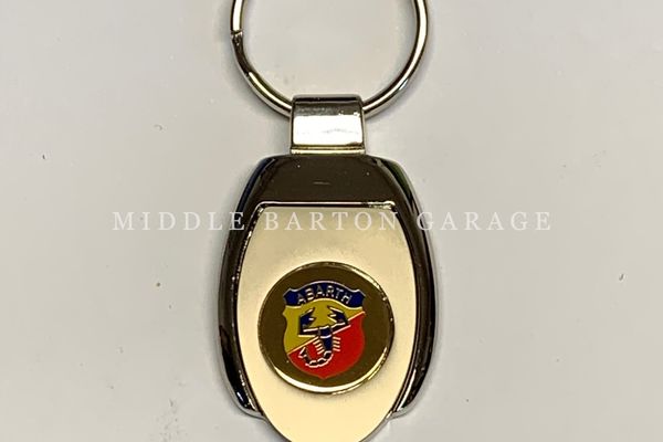 KEYRING - SILVER WITH GOLD ABARTH BADGE